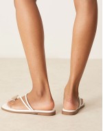 toe thong flat sandals in white