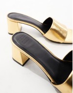 Hundred mid block heeled mules in gold
