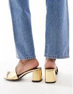 Hundred mid block heeled mules in gold